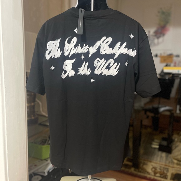 NWT Men’s Size Large AMIRI Airbrush Cherub Print Tee 100% Cotton In Black/Green - Picture 10 of 14